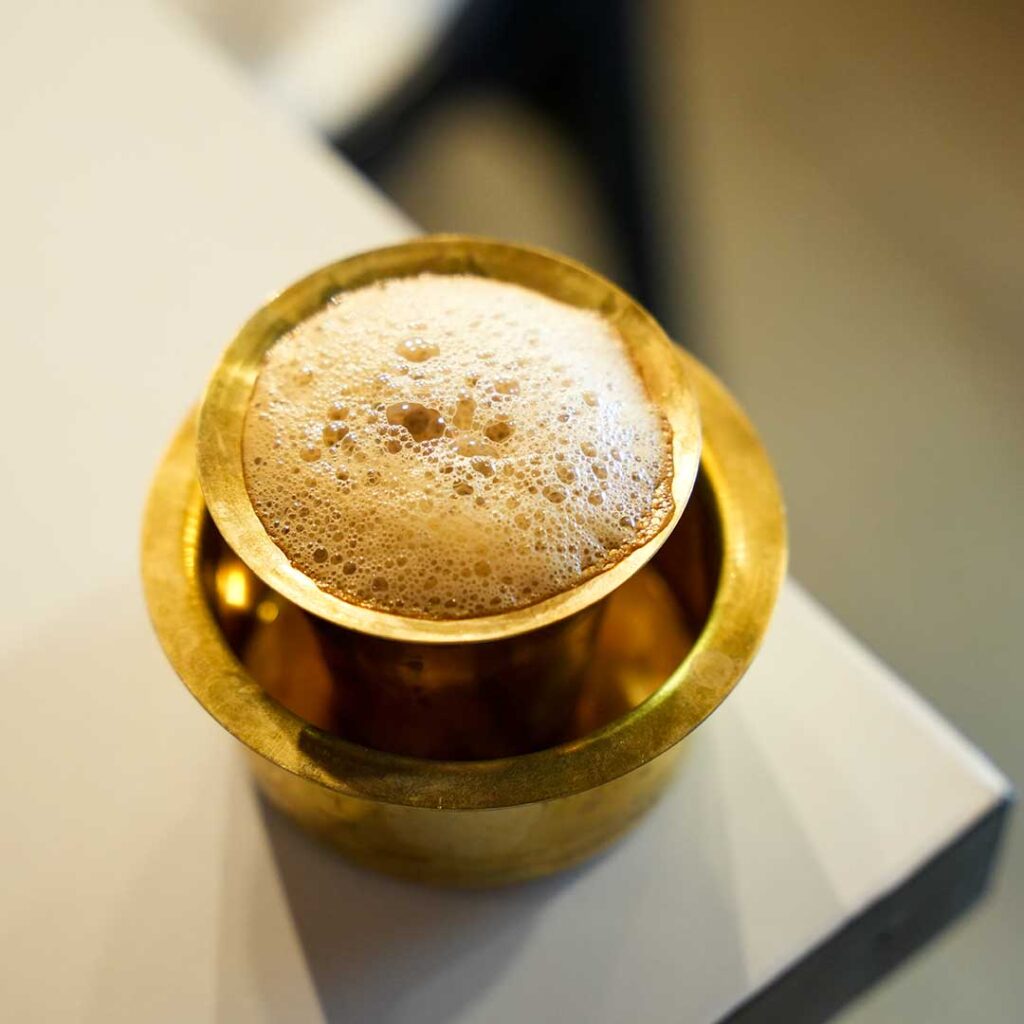 Filter coffee in a steel cup